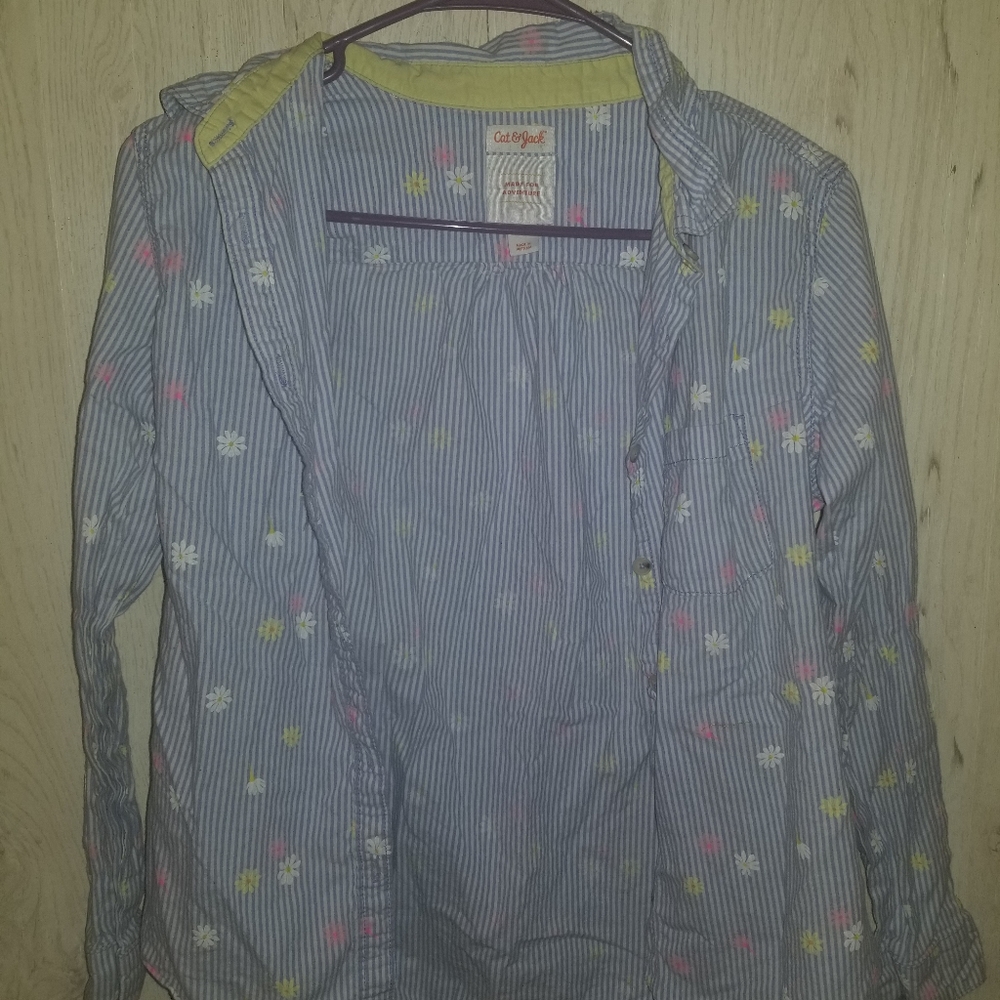 Long sleeve button down shirt.